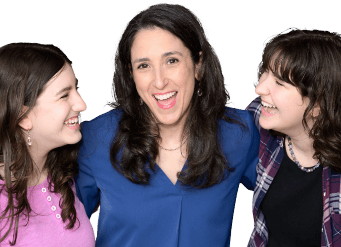 Three people sharing a joyful moment together.