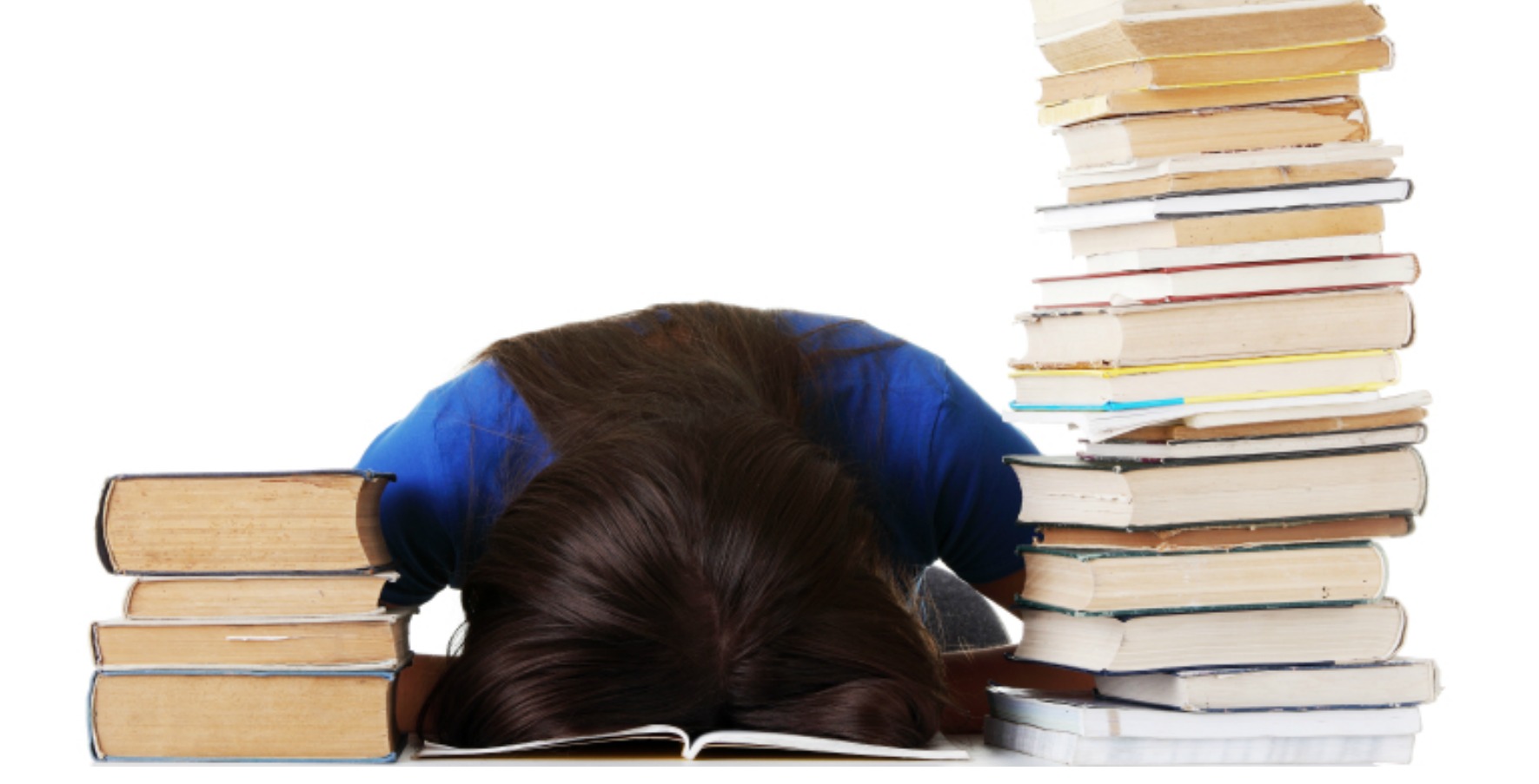 Student overwhelmed by a large pile of books rests head on an open textbook, seeking intuition for understanding.